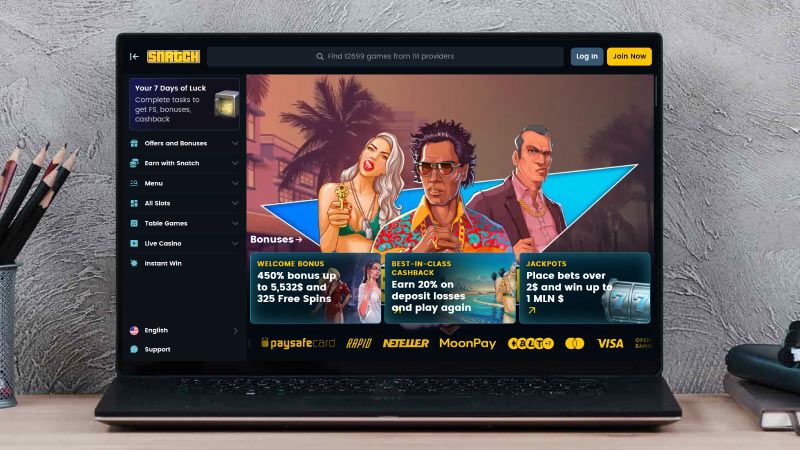 Laptop screen with Snatch Casino screenshot