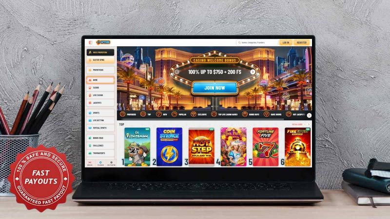 Wyns Casino homepage on a laptop