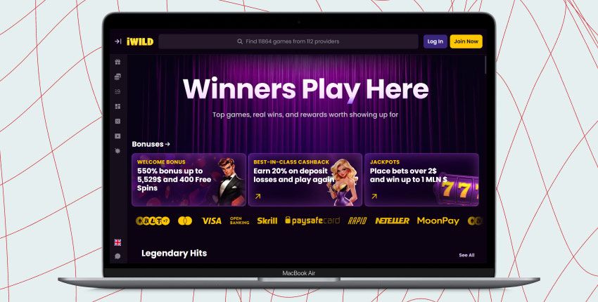 Laptop screen with iWild Casino screenshot