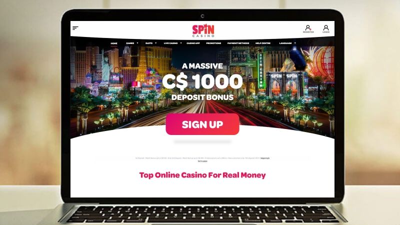 a laptop mockup with the spin casino main page in it