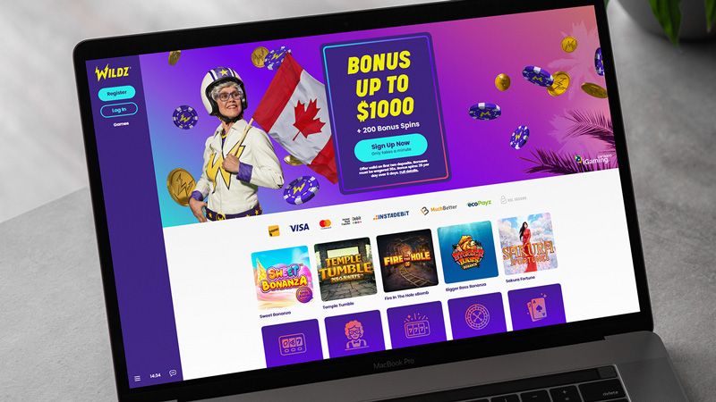 a laptop mockup with the wildz casino main page in it