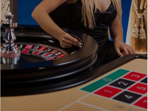 Live Casino Dealer at Roulette Table