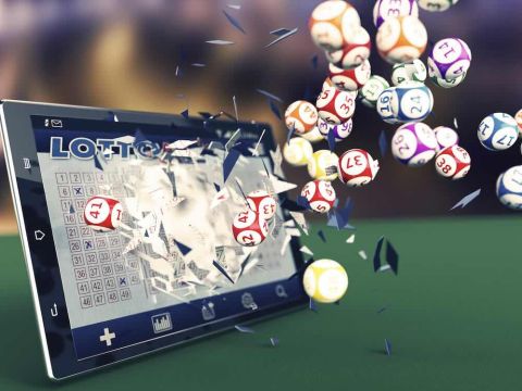 a tablet with lottery balls